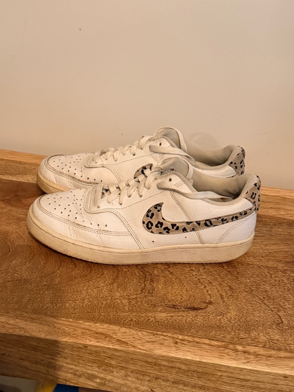 Nike Women’s White Sneakers with Leopard Swoosh Accent
